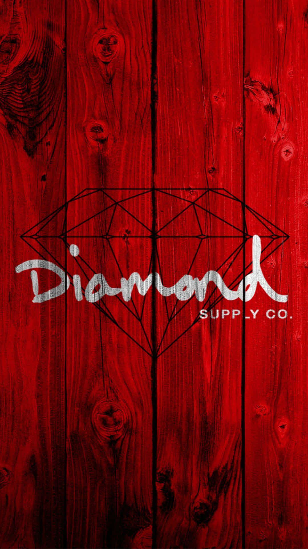 Papelde Parede Do Diamond Supply Co Com O Logotipo Em Vermelho Na Madeira. Papel de Parede