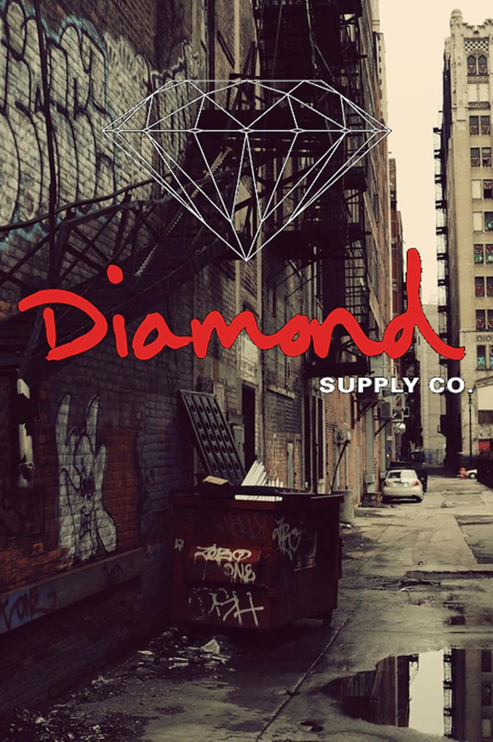 Diamondsupply Co - En Byggnad Täckt Av Graffiti. Wallpaper