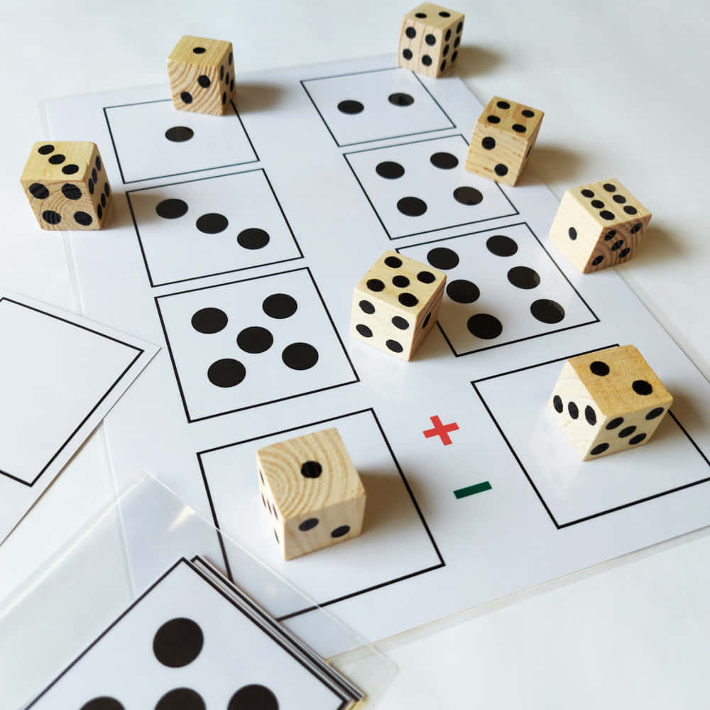 A Set Of Dice With Numbers On Them