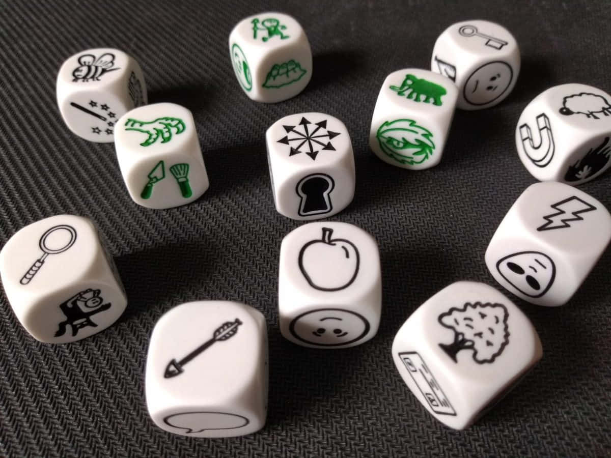 A Set Of Dice With Different Symbols On Them