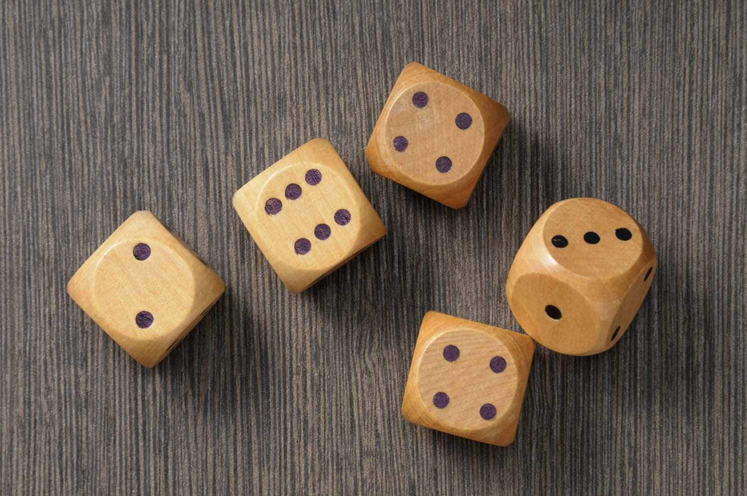 Wooden Dice On A Wooden Table
