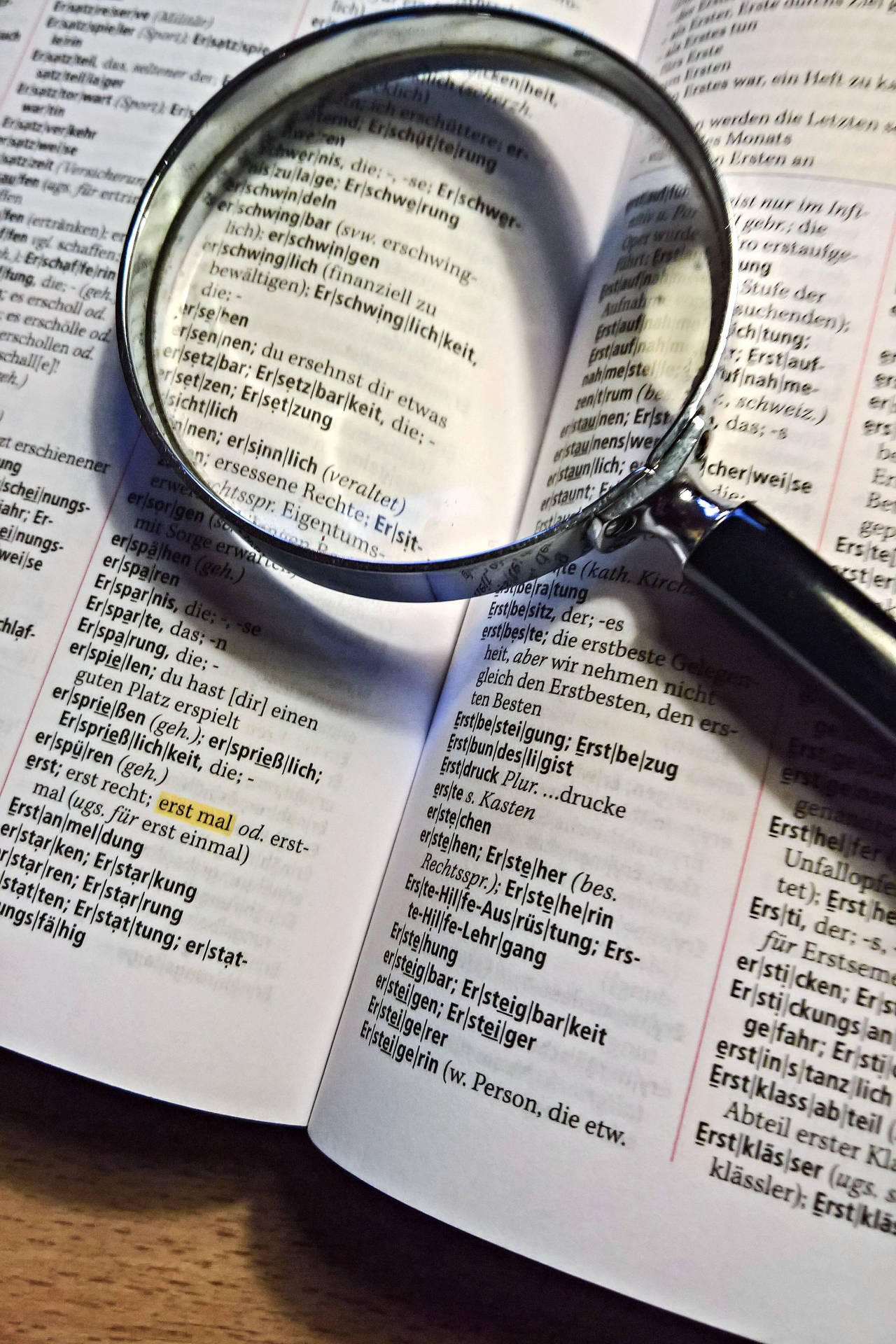 Dictionary With Magnifying Glass Wallpaper