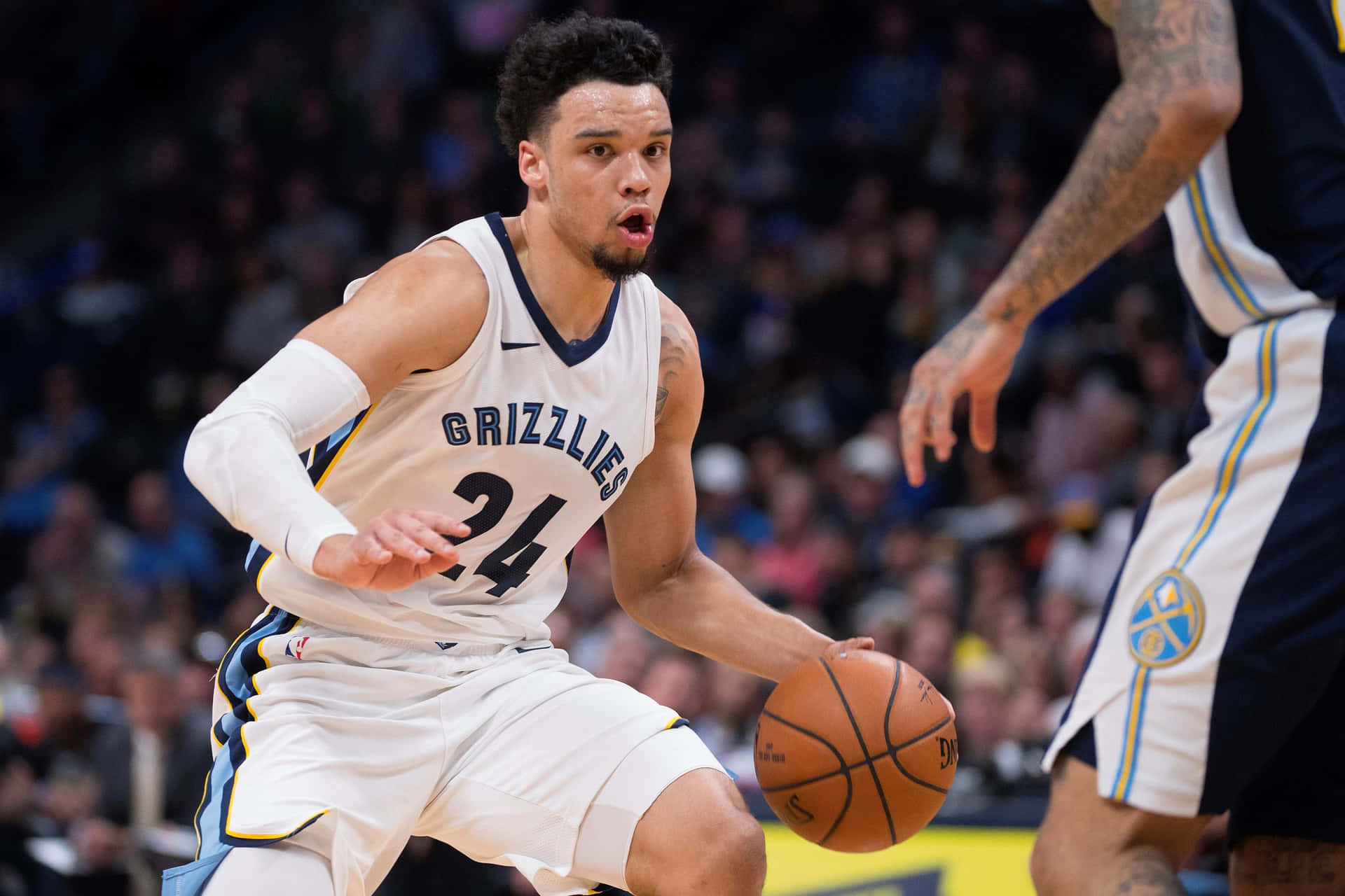 Dillon Brooks in action during a basketball game Wallpaper