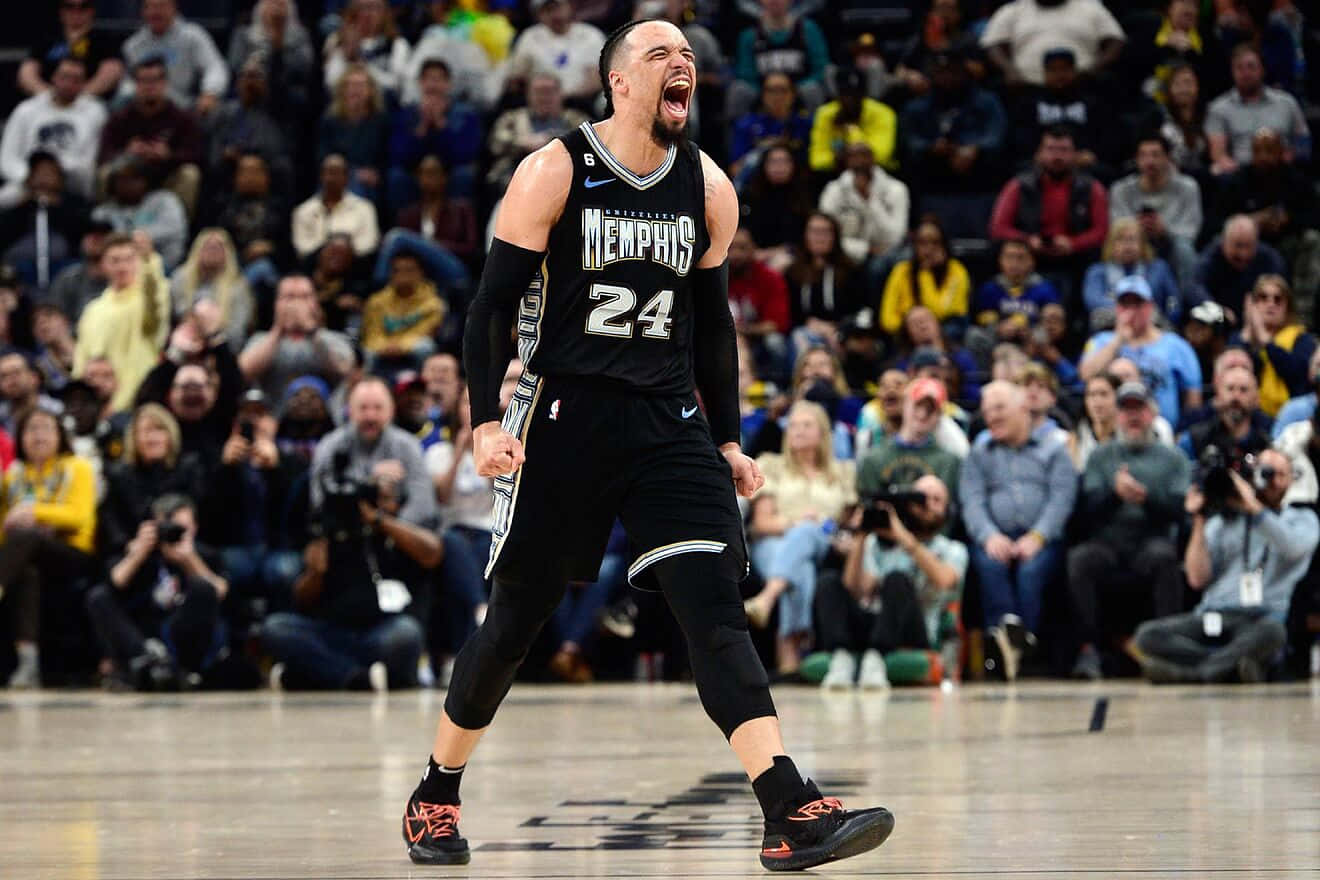 Dillon Brooks En Action Sur Le Terrain De Basket Fond d'écran