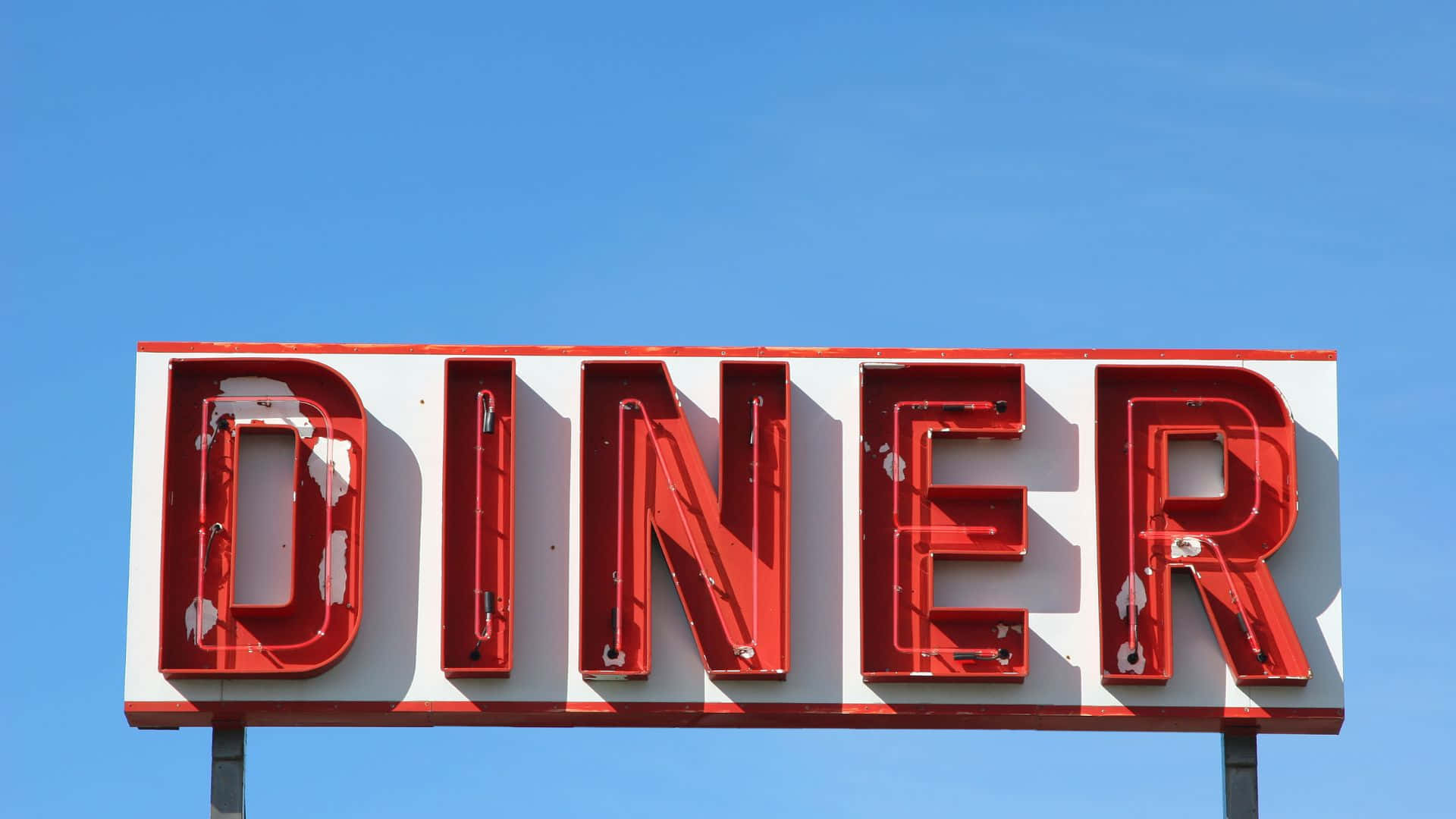Retro diner aesthetics with neon lights and vintage interior
