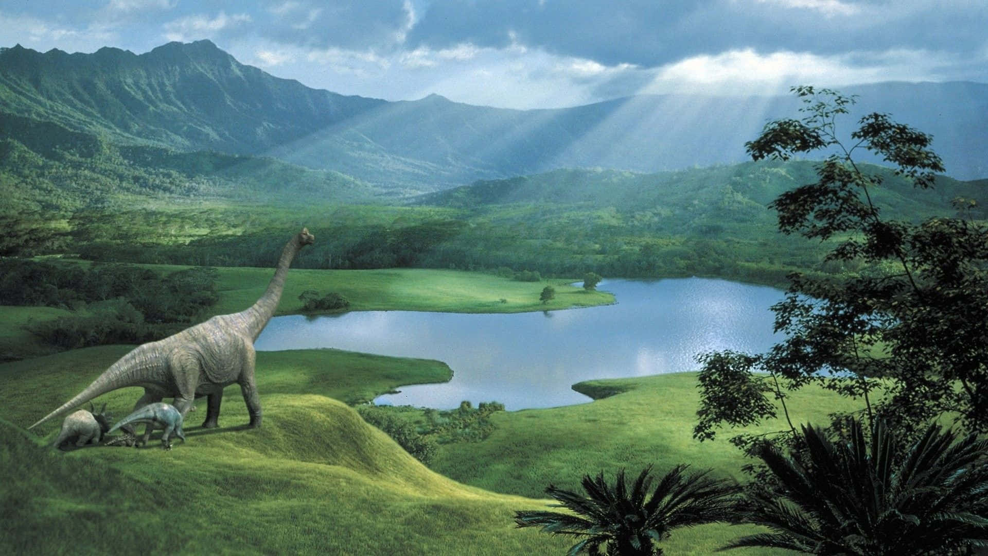A Dinosaur Is Standing In A Grassy Field Near A Lake