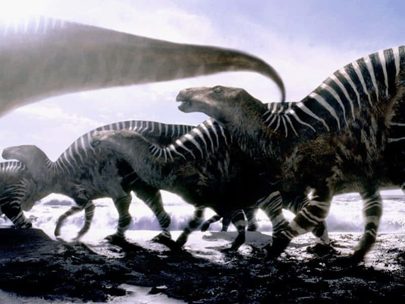 Iguanodonpromenerar Med Dinosaurier Bild (computer Or Mobile Wallpaper)