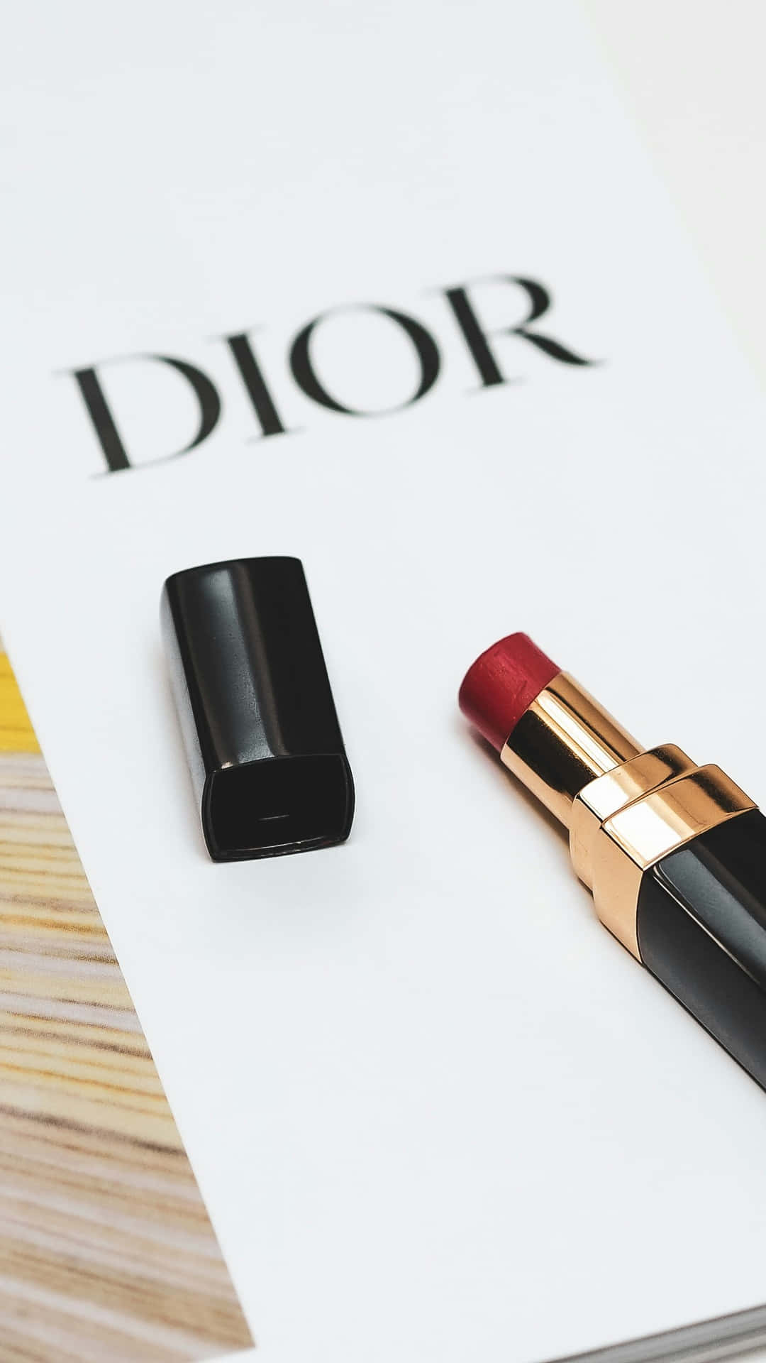 Dior Branded Lipstickand Caseon White Wallpaper