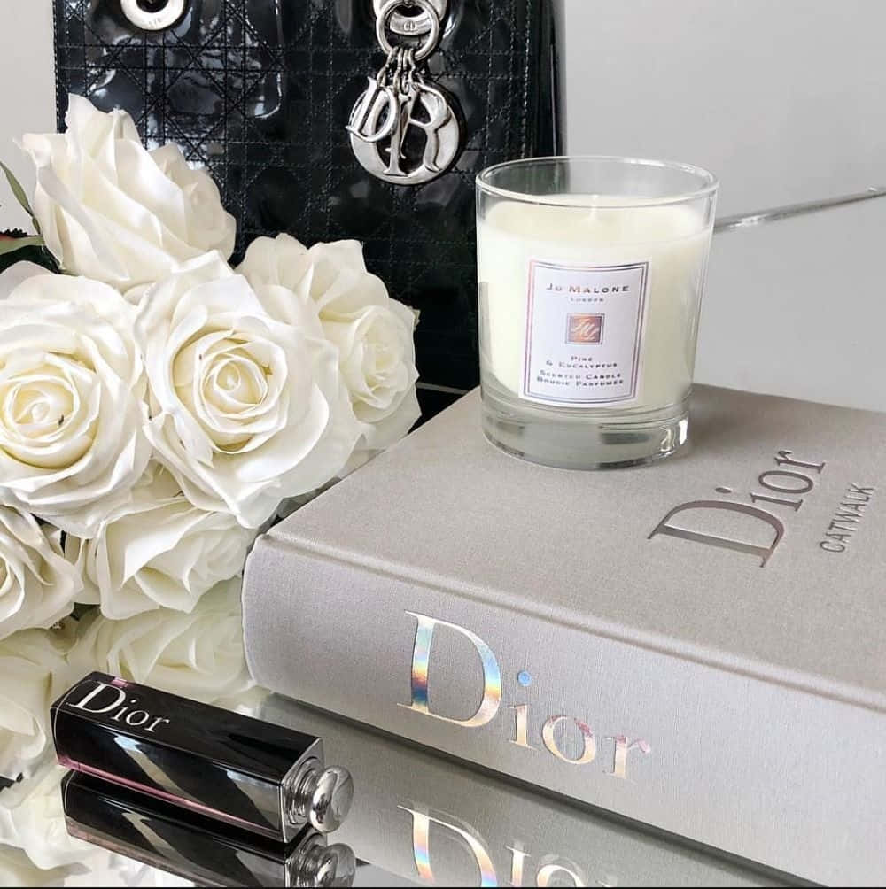 Dior Luxury Aestheticwith Candleand Flowers Wallpaper