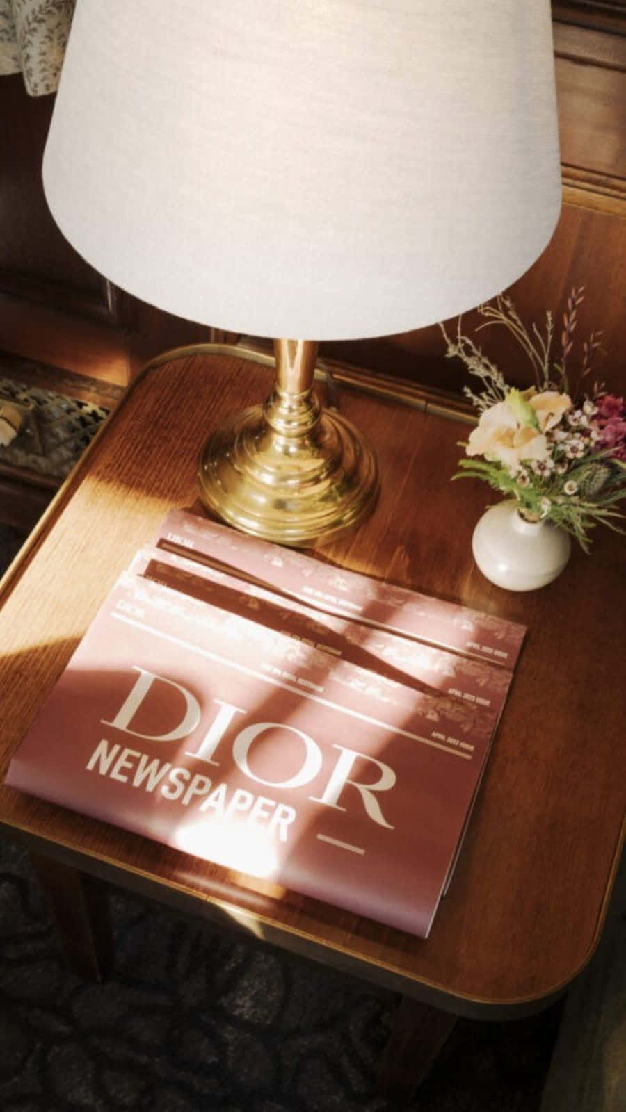 Dior Newspaperon Wooden Table Wallpaper
