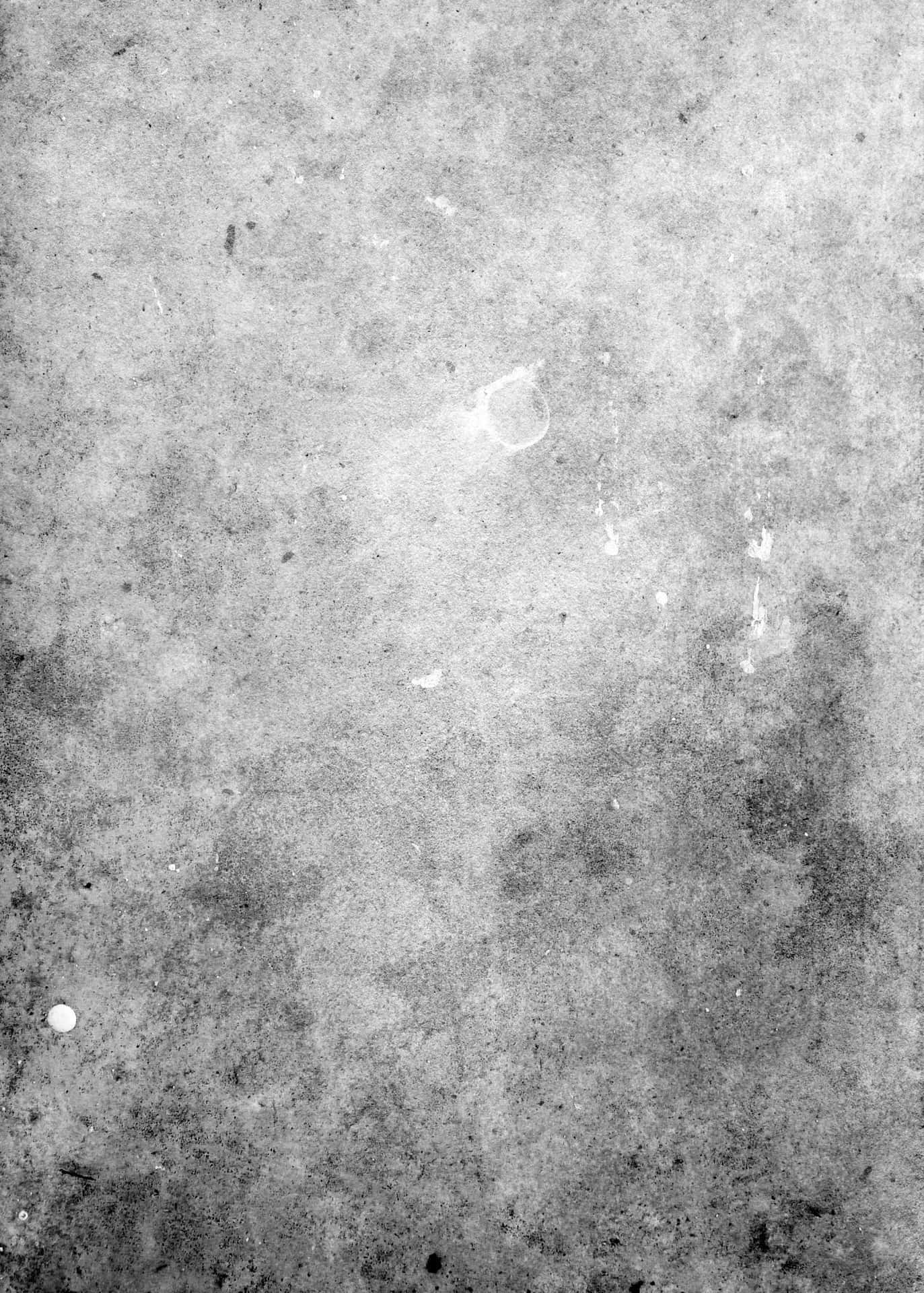 A Black And White Photo Of A Concrete Floor
