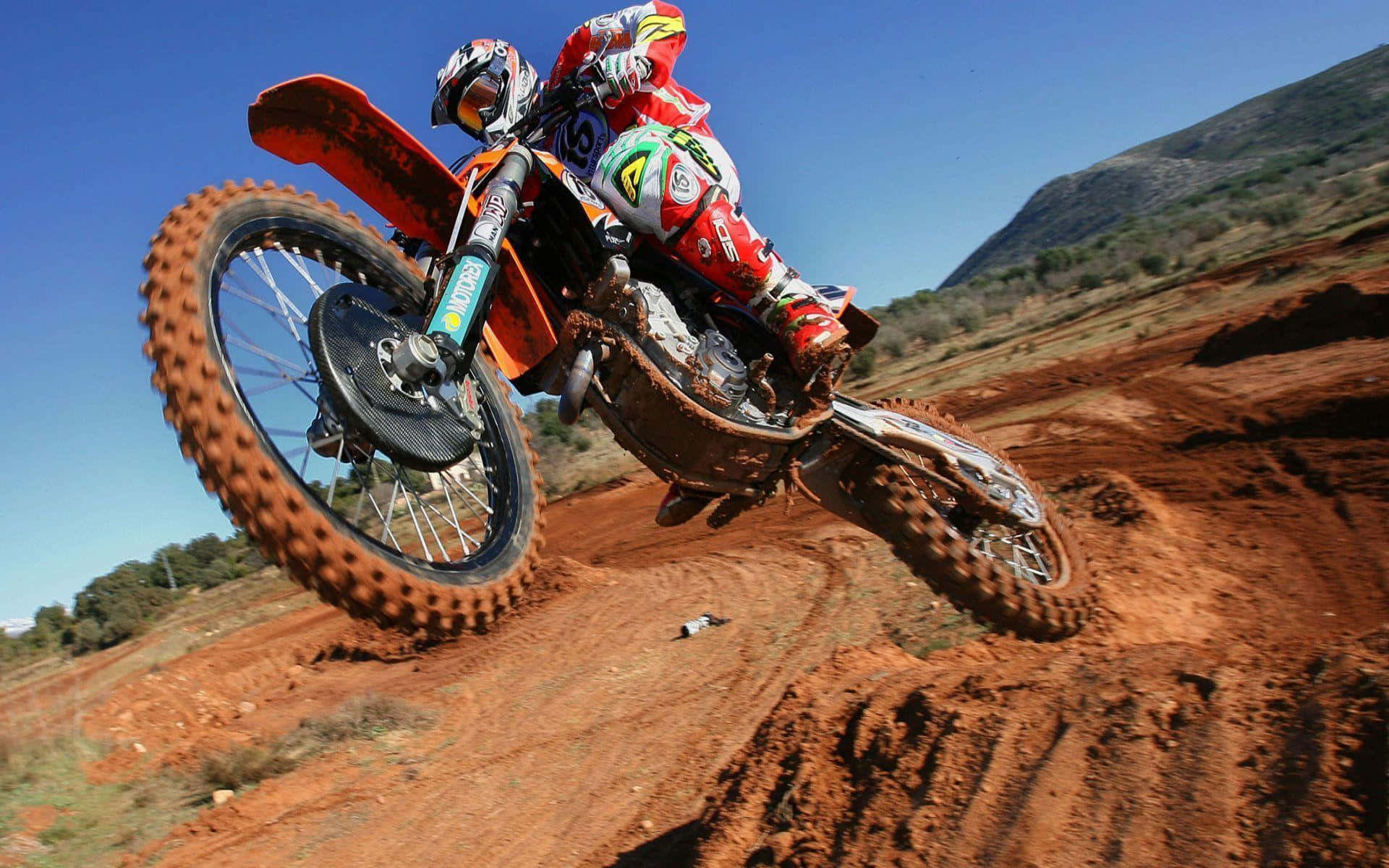 Motocross Rider Catching Air on a Dirt Bike