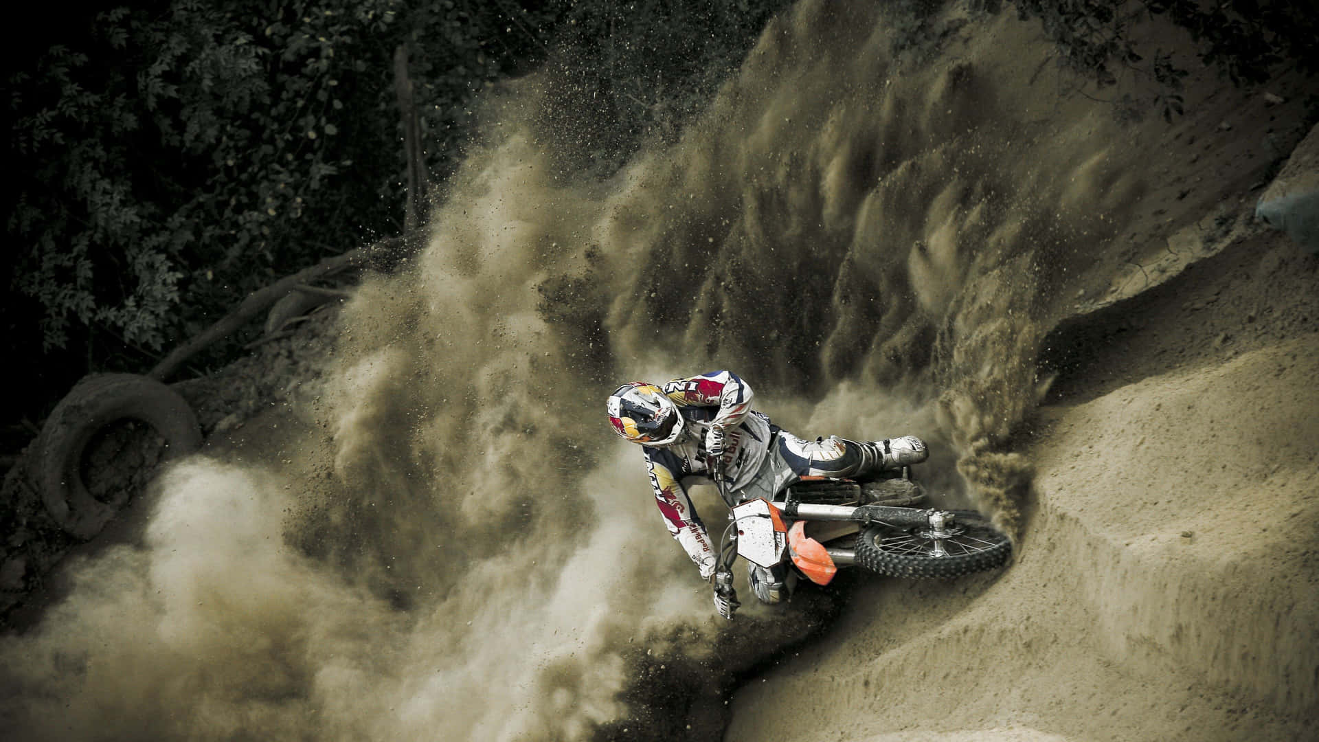 Action-packed dirt bike riding on a motocross track