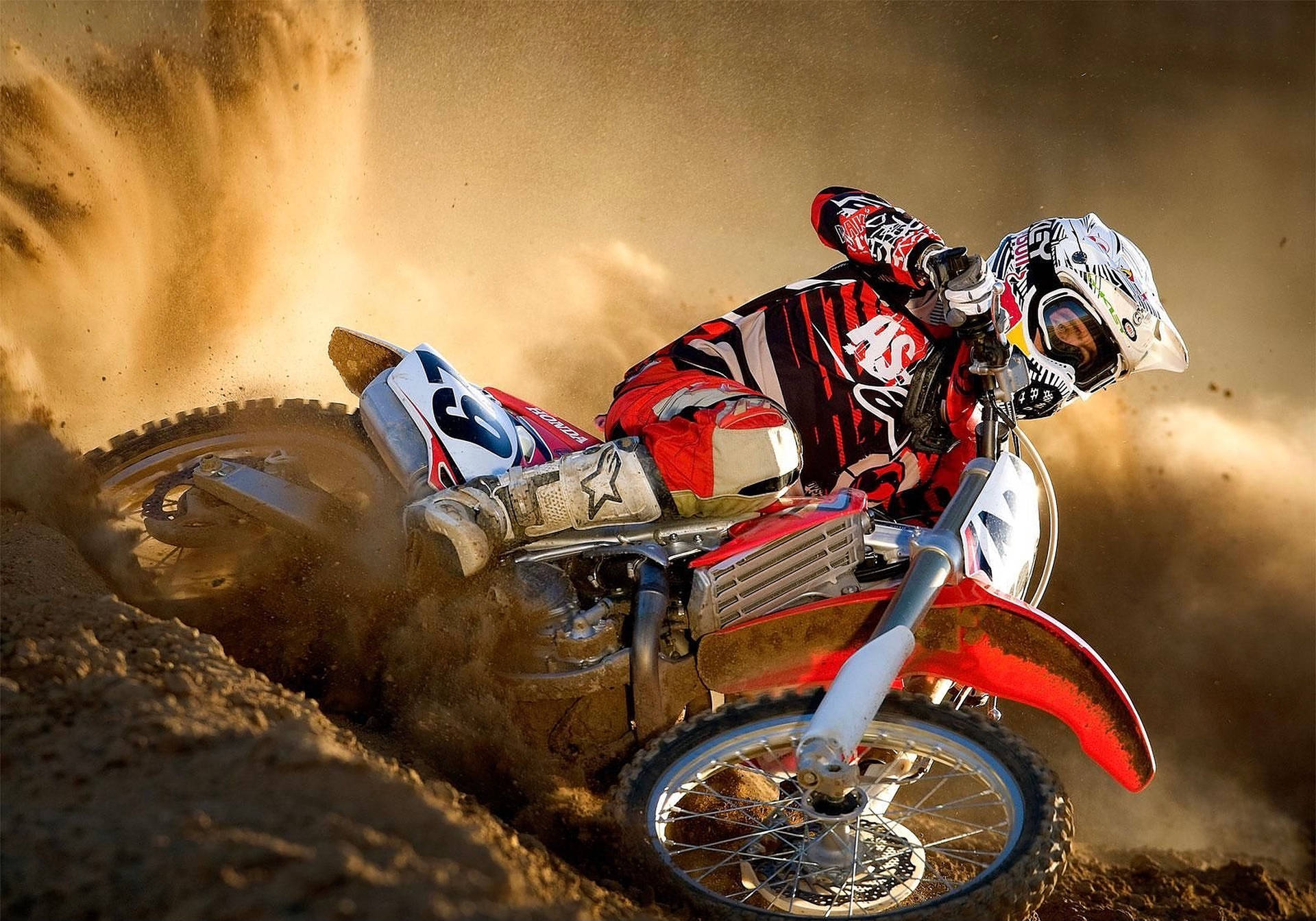 Thrilling Supercross: Unleashing the Monster Dirt Bike Wallpaper