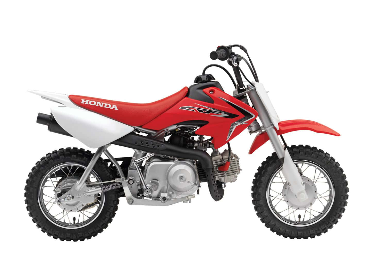 A Red And White Dirt Bike On A White Background