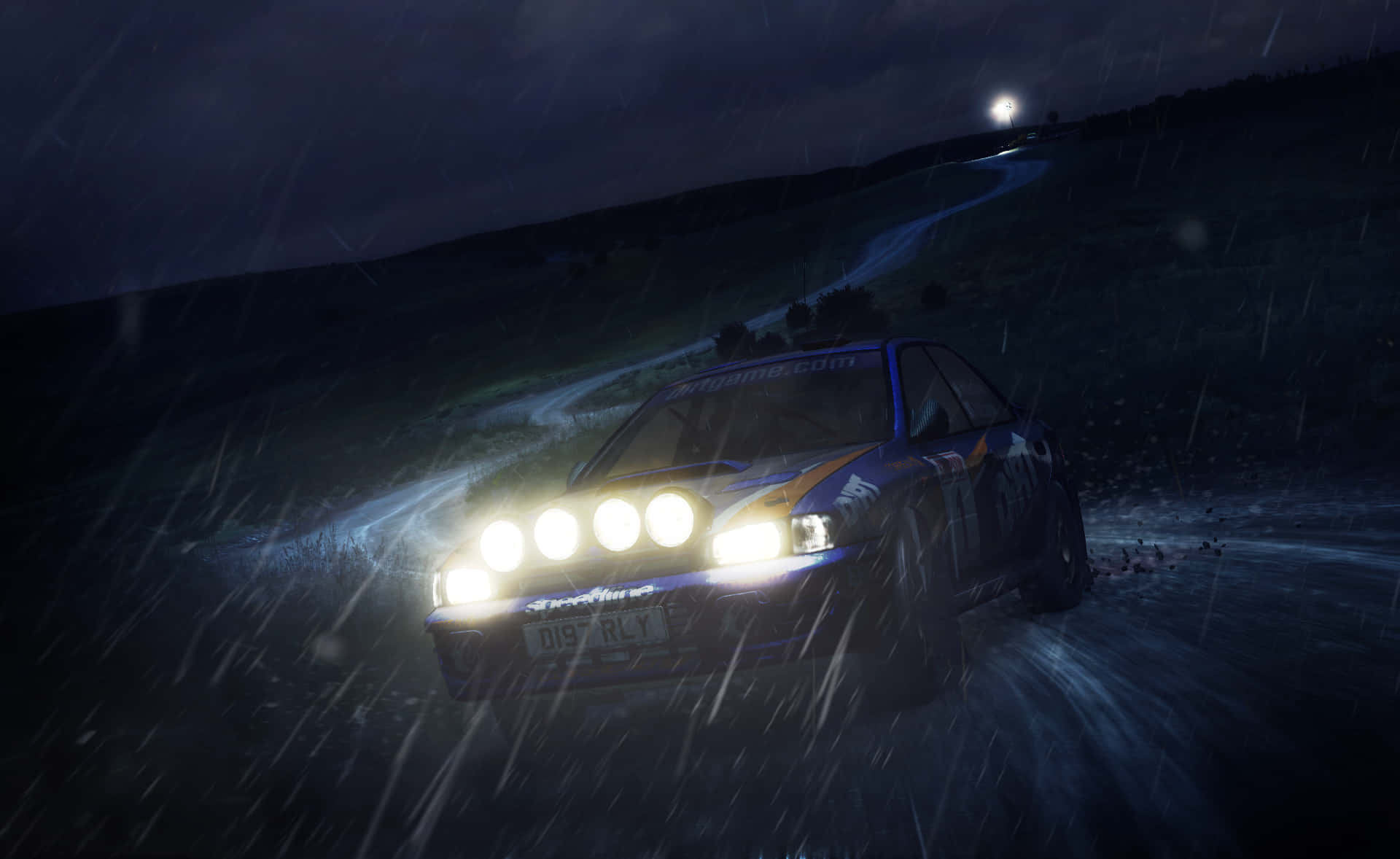 A Car Driving Through A Rainy Night Wallpaper