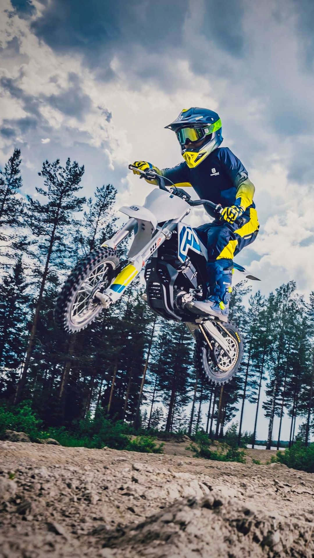 Rider Jumping High on a Motocross Dirt Bike