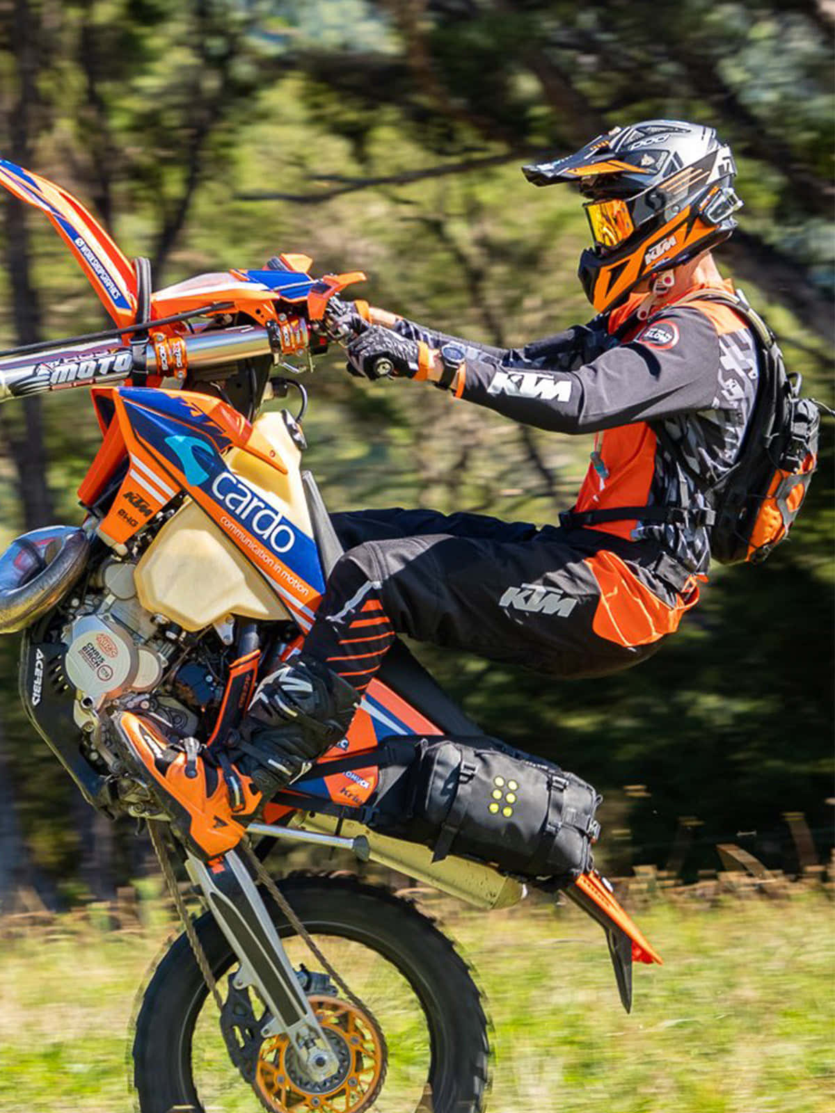 Rider climbing a challenging slope on a dirtbike