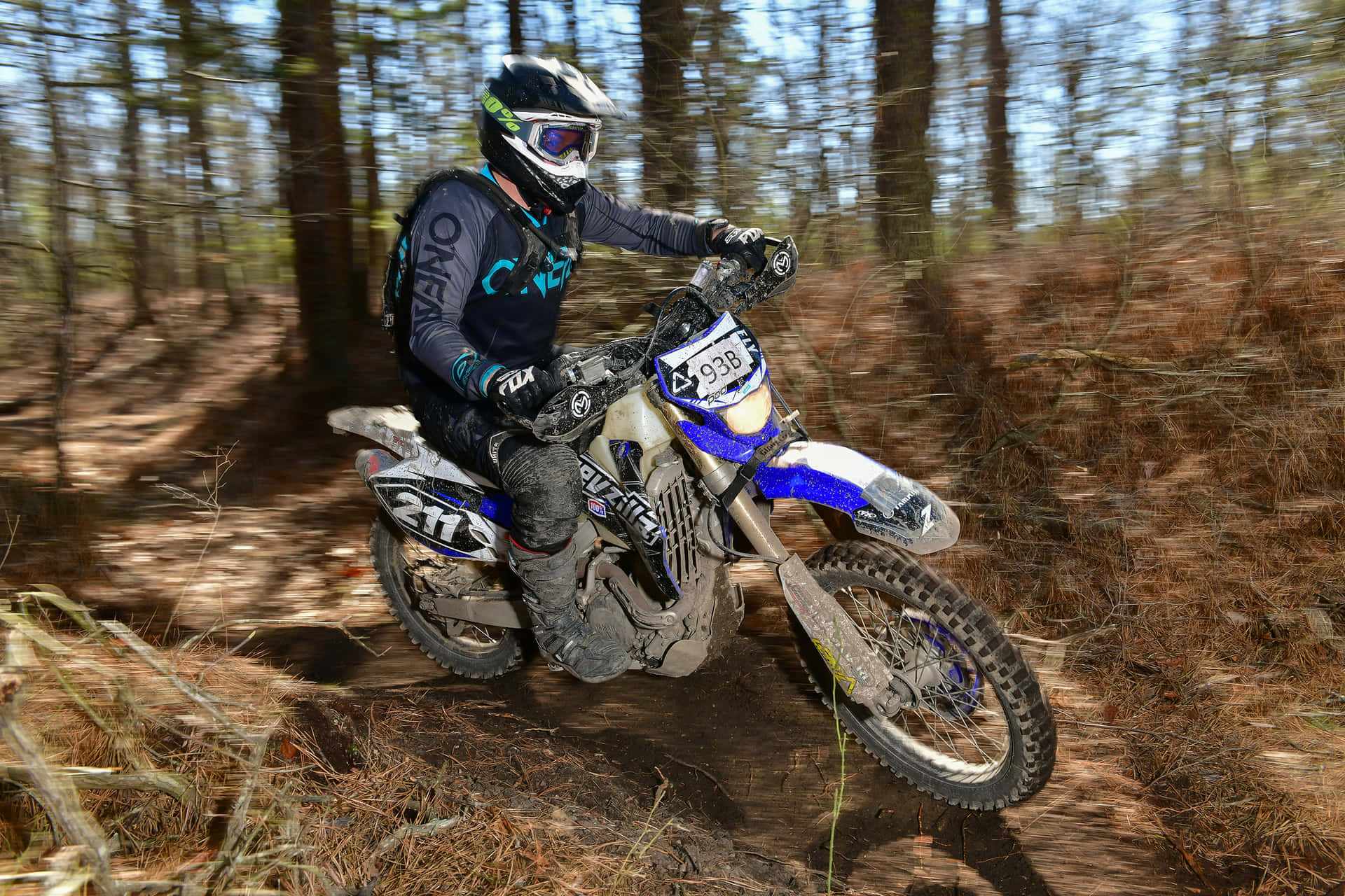 Rider conquering the terrain on a high-speed dirtbike.