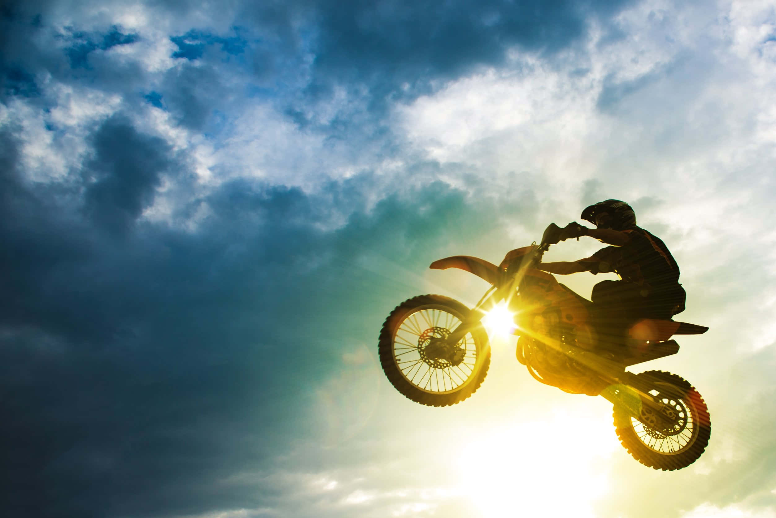 High-flying motocross rider conquering the dirt track