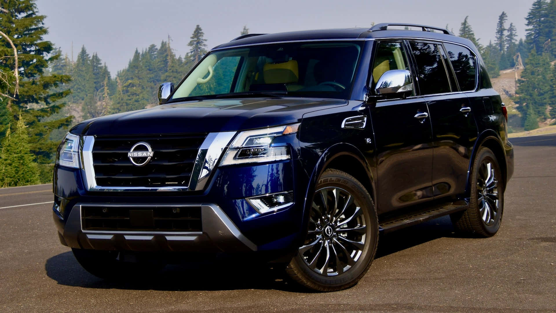 Discover The Power - Nissan Armada In Action Wallpaper