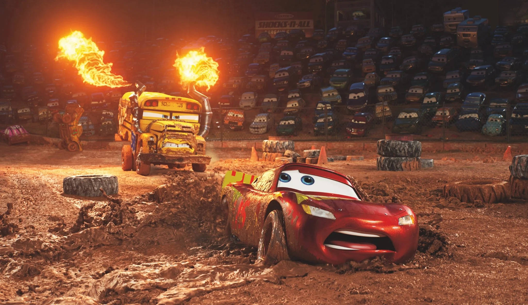 Action-Filled Racing Scene At Disney's Cars Mud Pit Wallpaper
