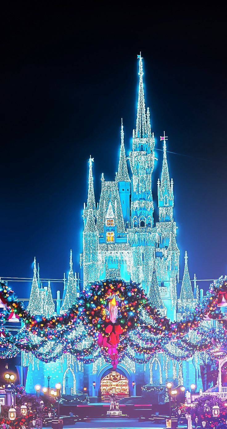 Disney Christmas Castle Med Blå Lys Wallpaper