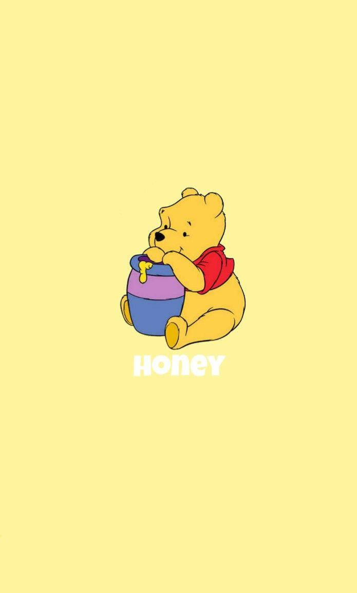 Disney Winnie The Pooh Eating Honey Wallpaper