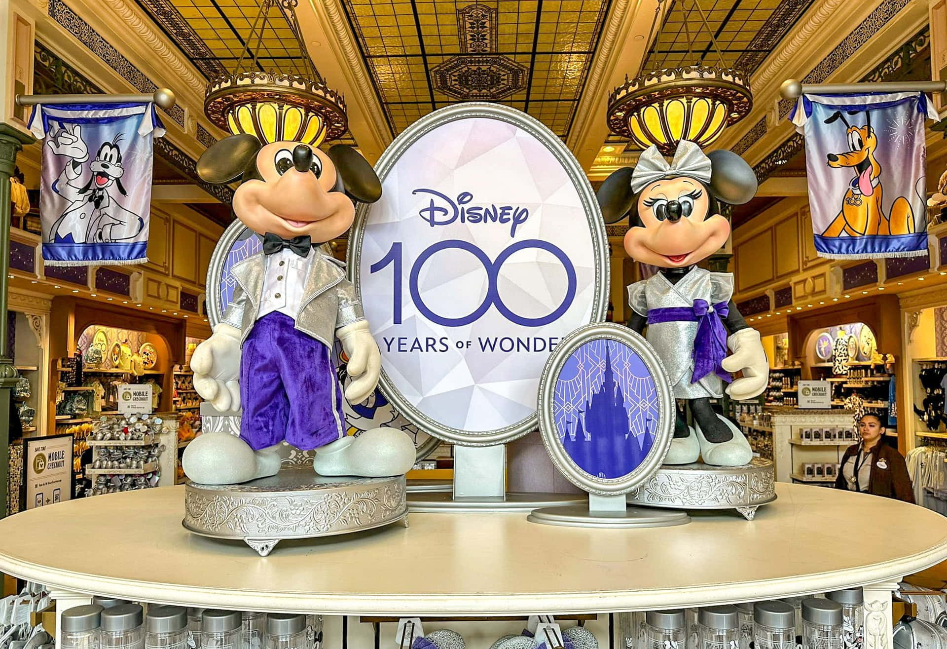 Disney100 Celebration Displaywith Mickeyand Minnie Wallpaper