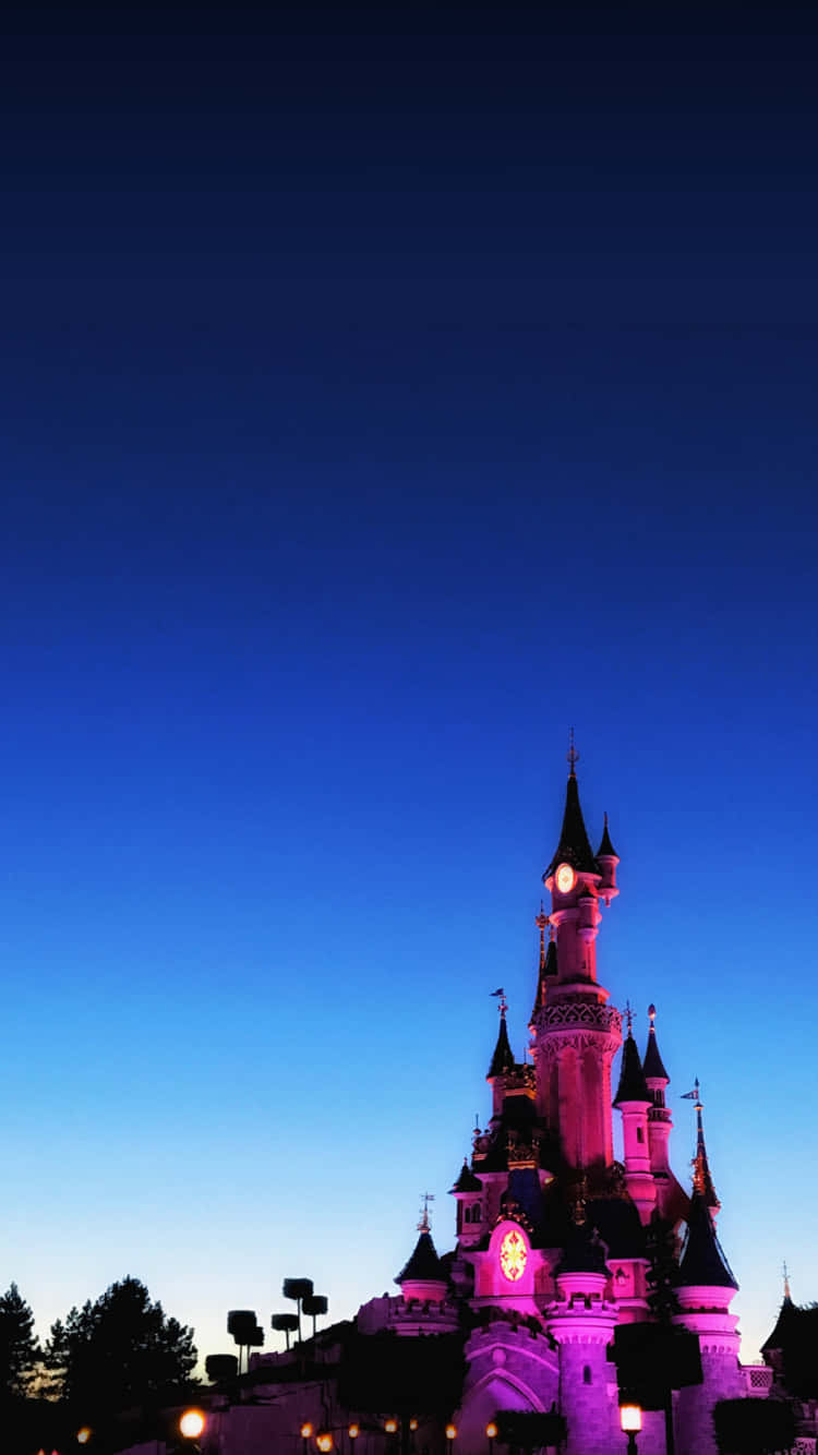 Disneylandparis Illuminato Da Un Intenso Colore Fucsia Sfondo