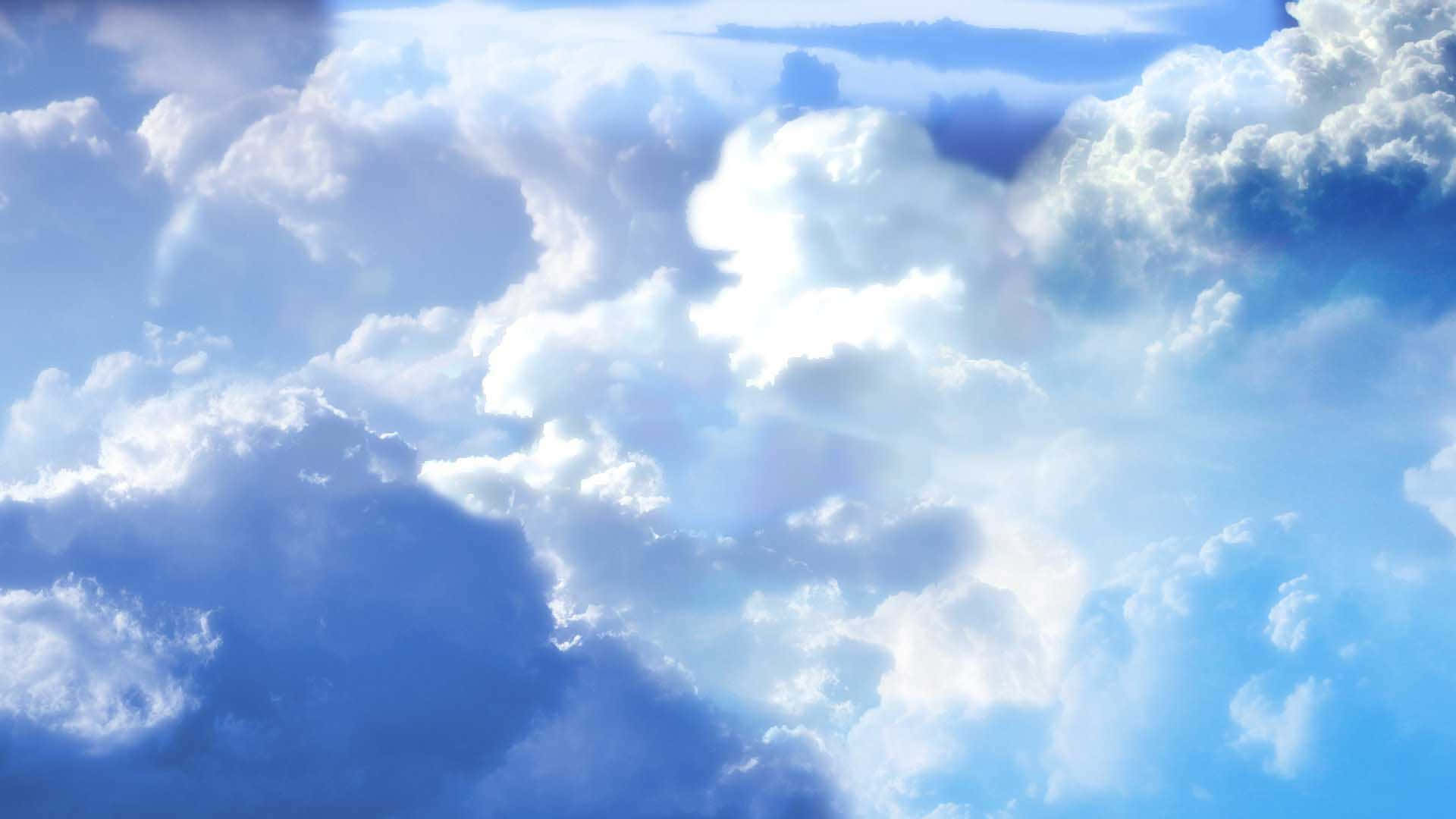 Divine Sunshine Piercing Through Ethereal Clouds Wallpaper