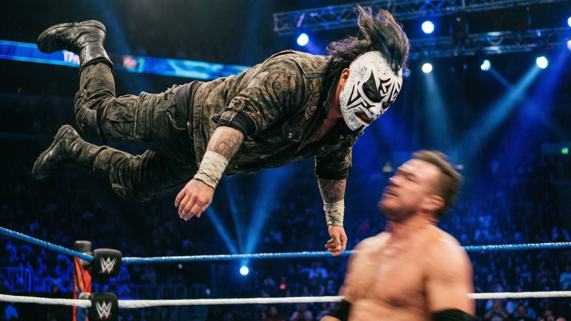 Wrestler in camouflage mask leaps toward opponent in ring under bright lights.