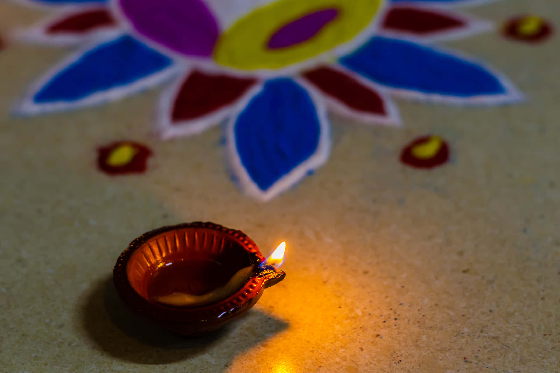 Ljusbredvid Rangoli Konst Diwali Bakgrund.