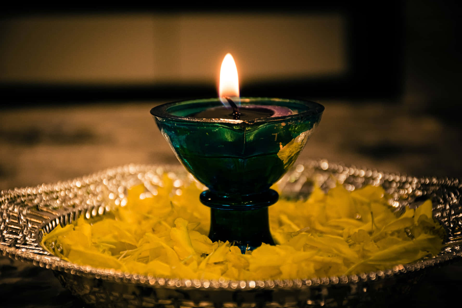 Diwali Candle In Green Glass Background
