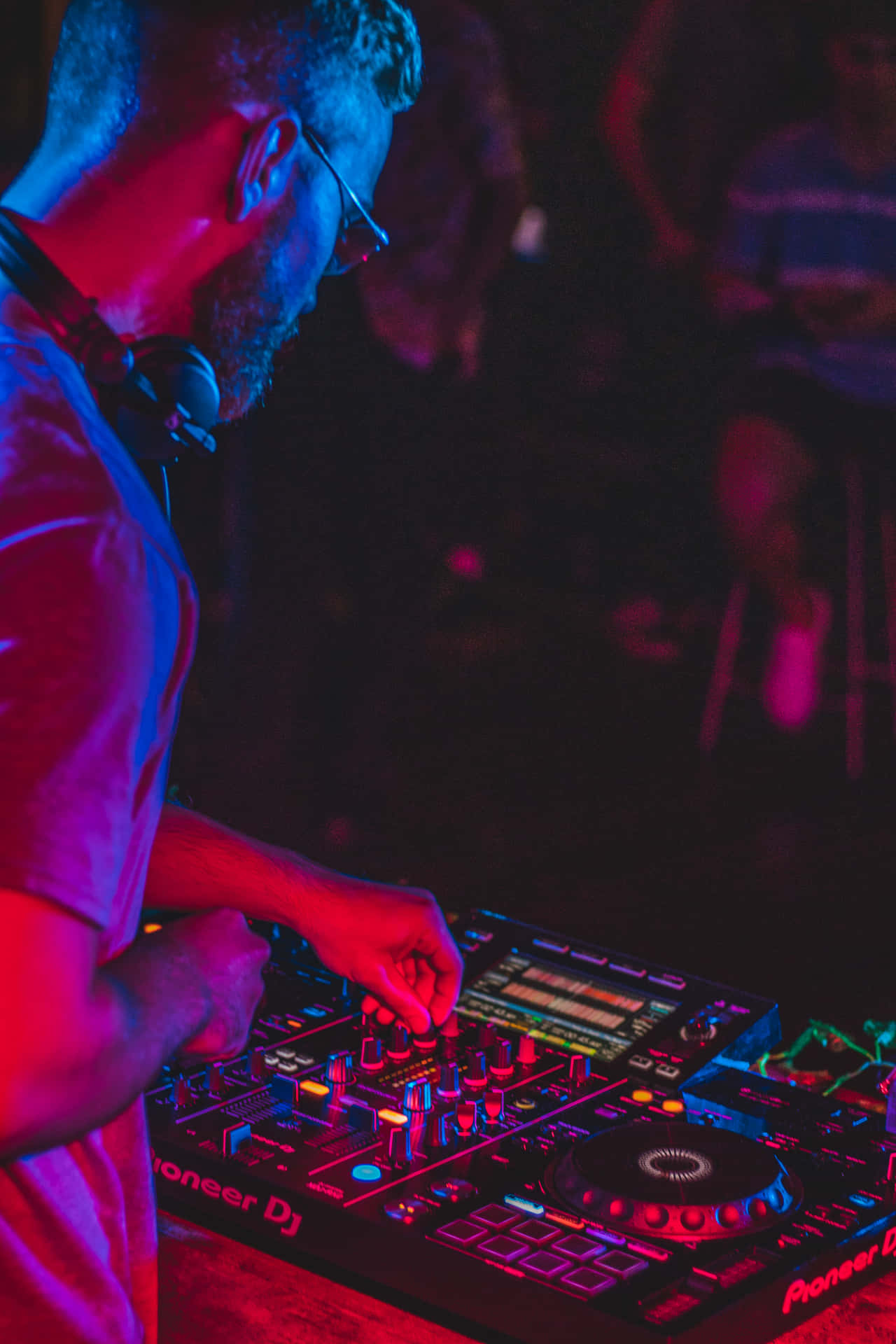 Captivating DJ Performing at a Nightclub