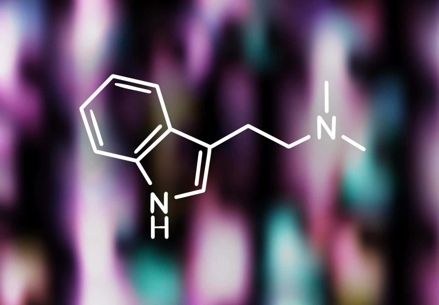 Et molekyle af en medicin vises på en farverig baggrund. Wallpaper
