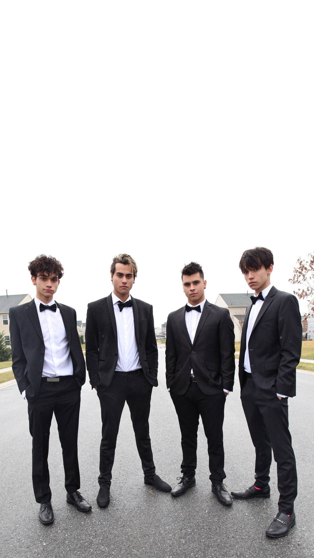 Dobre Brothers In Formal Suits Wallpaper
