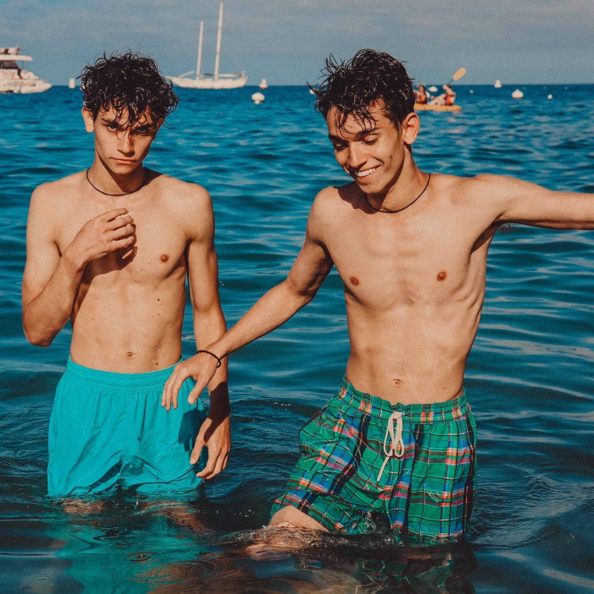 Dobre Brothers Twins On Water Wallpaper