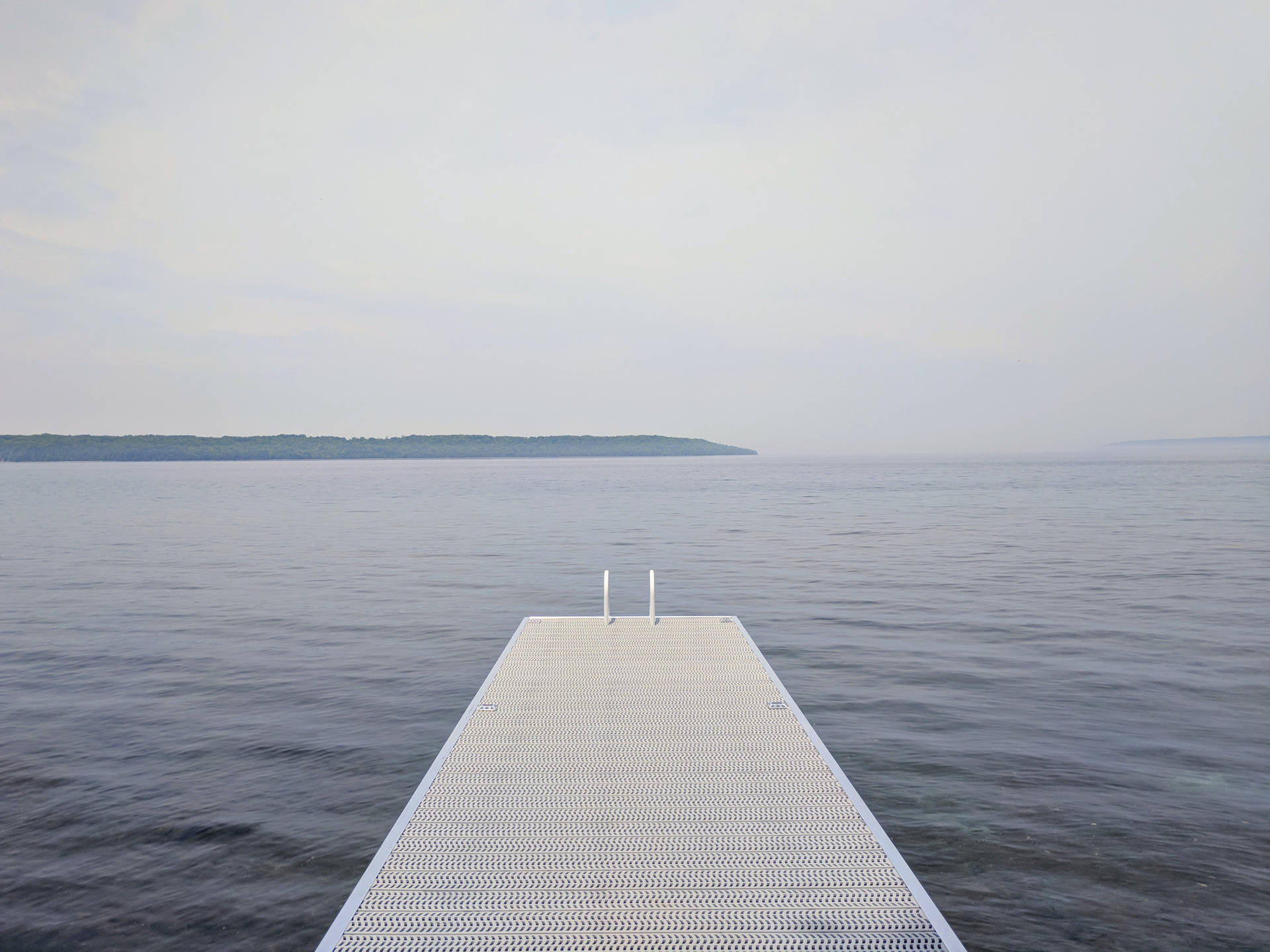 Dock At A Calming Lake Scenery Wallpaper