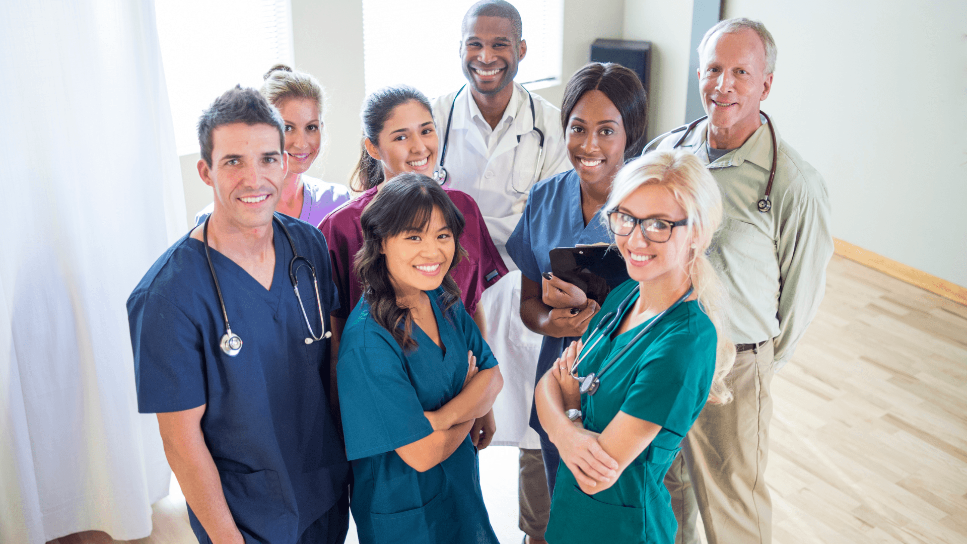 A Group Of Doctors And Nurses Standing Together