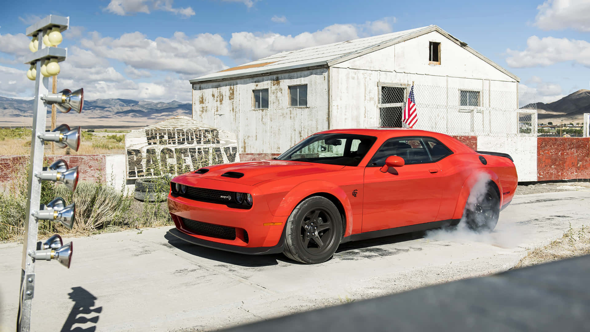 Experience the Thrill of Driving the Dodge Challenger Wallpaper
