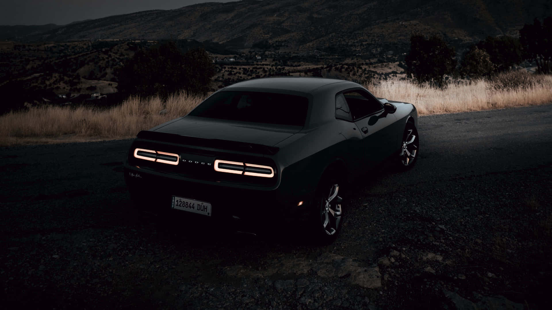 Feel the thrill of the open road in a Dodge Challenger Wallpaper