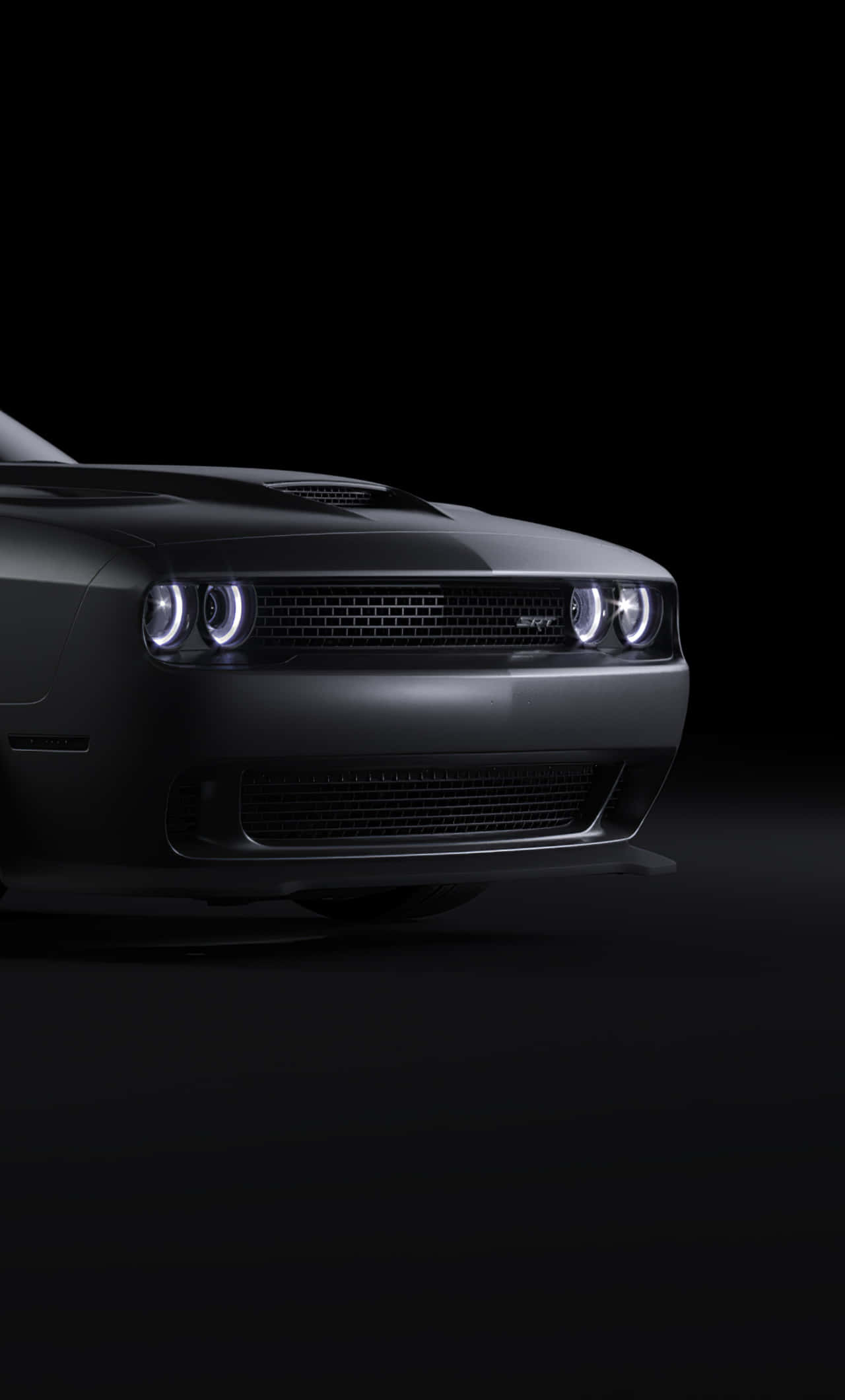 Experience the Thrill of the Open Road with the Dodge Challenger Wallpaper