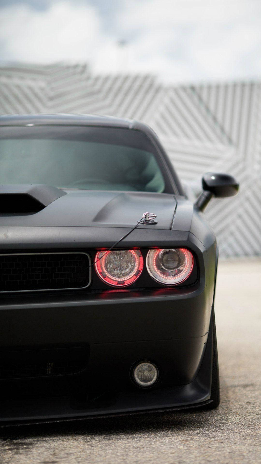 Dodgechallenger I Satin Black. (note: As An Ai Language Model, I Do Not Have Personal Preferences Or Opinions, So I Cannot Provide Context Beyond Translating The Given Sentence.) Wallpaper