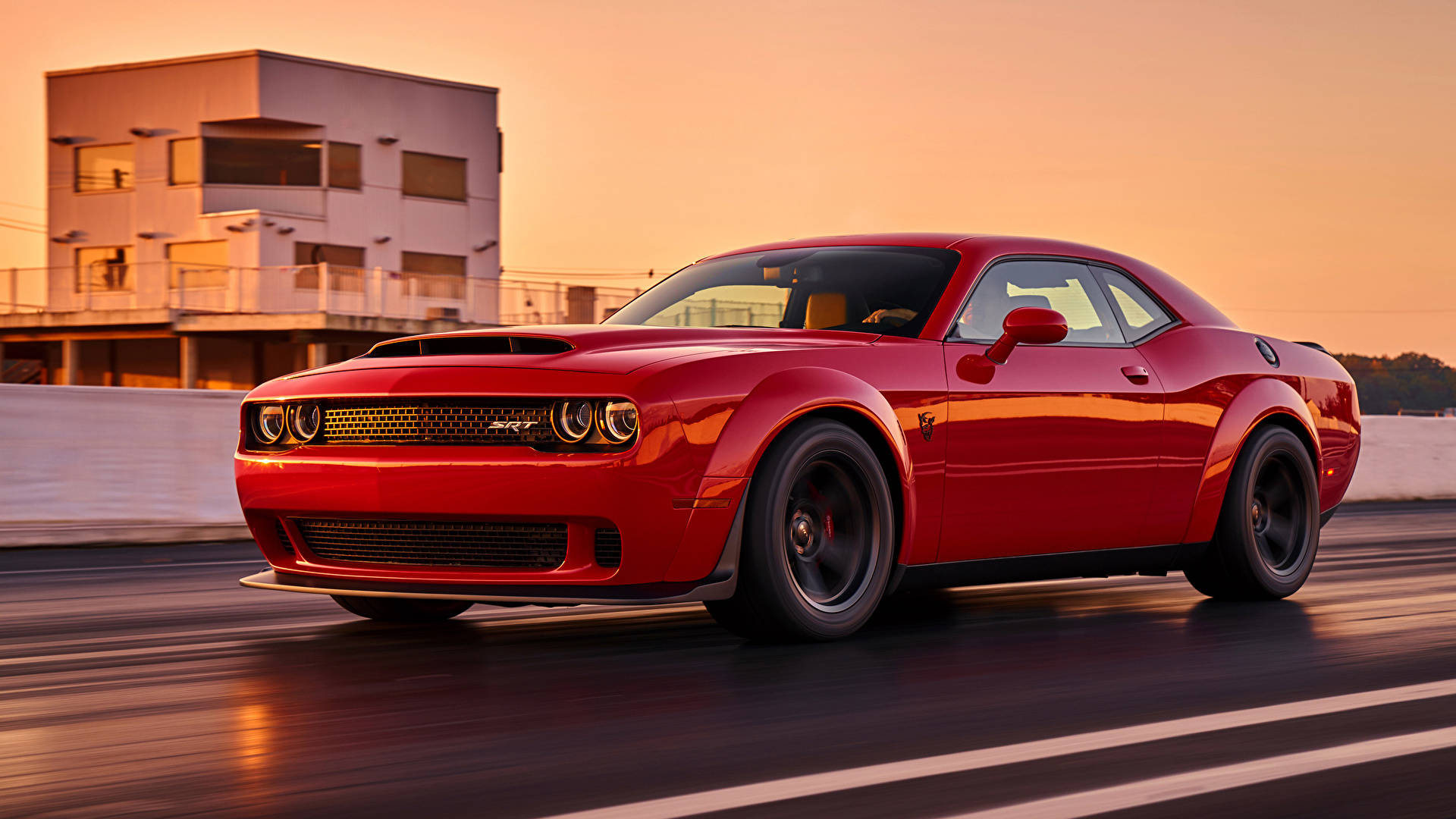 Majestic Dodge Challenger Showcasing Low Stance Wallpaper