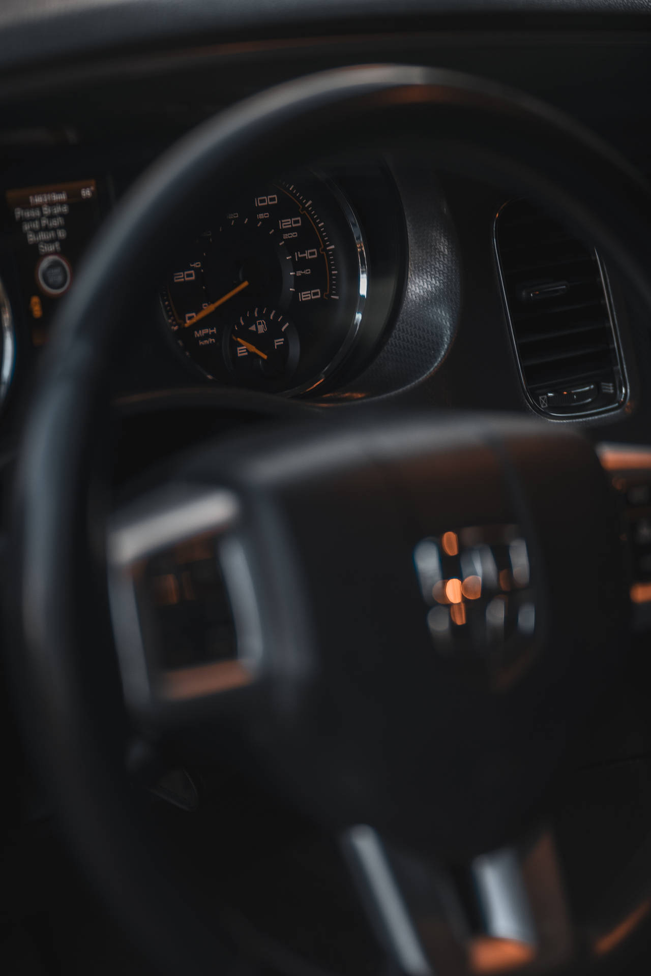 Immerse in speed with the Dodge Challenger Speedometer Wallpaper
