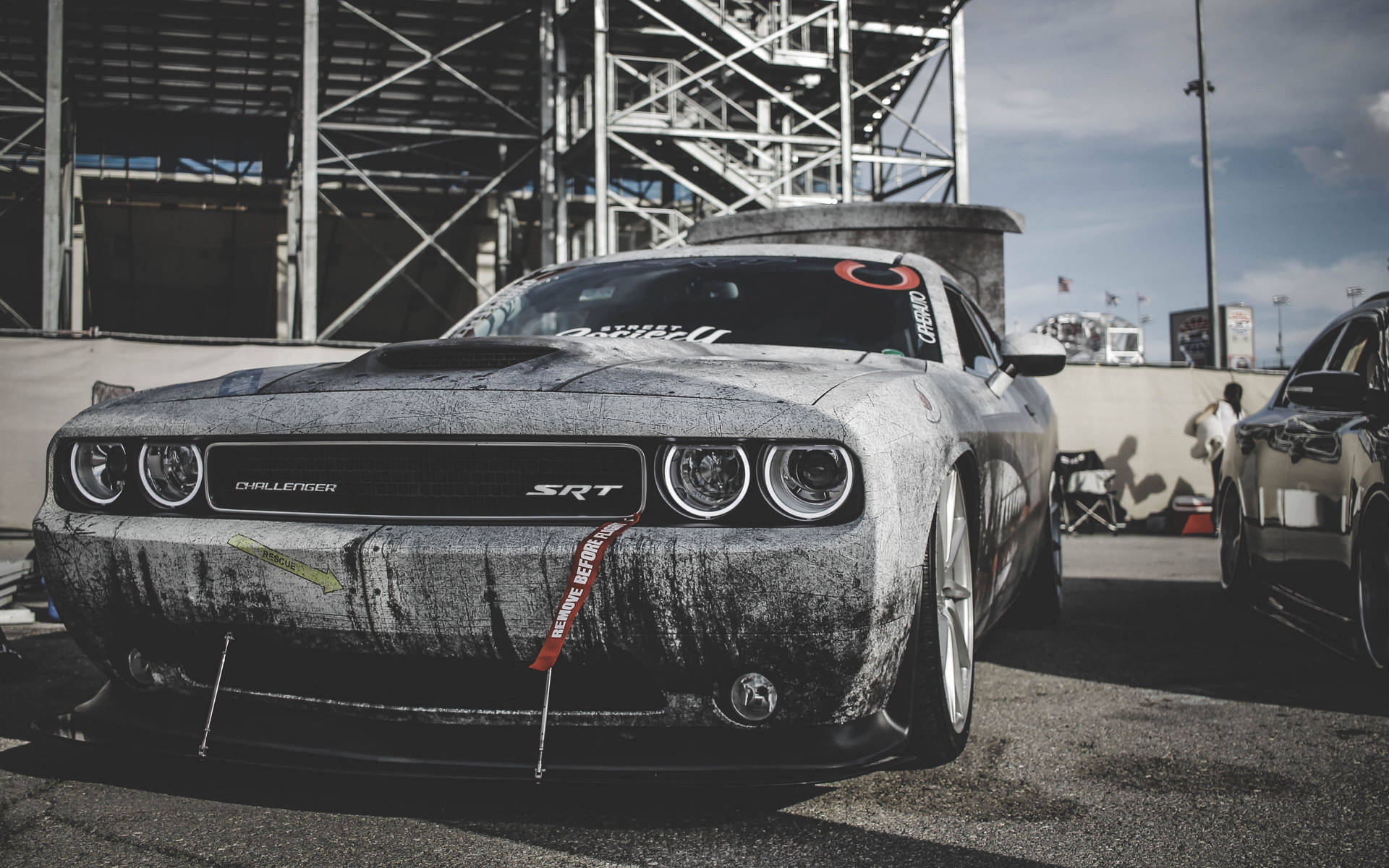 Dodge Challenger With Grungy Black Paint Wallpaper