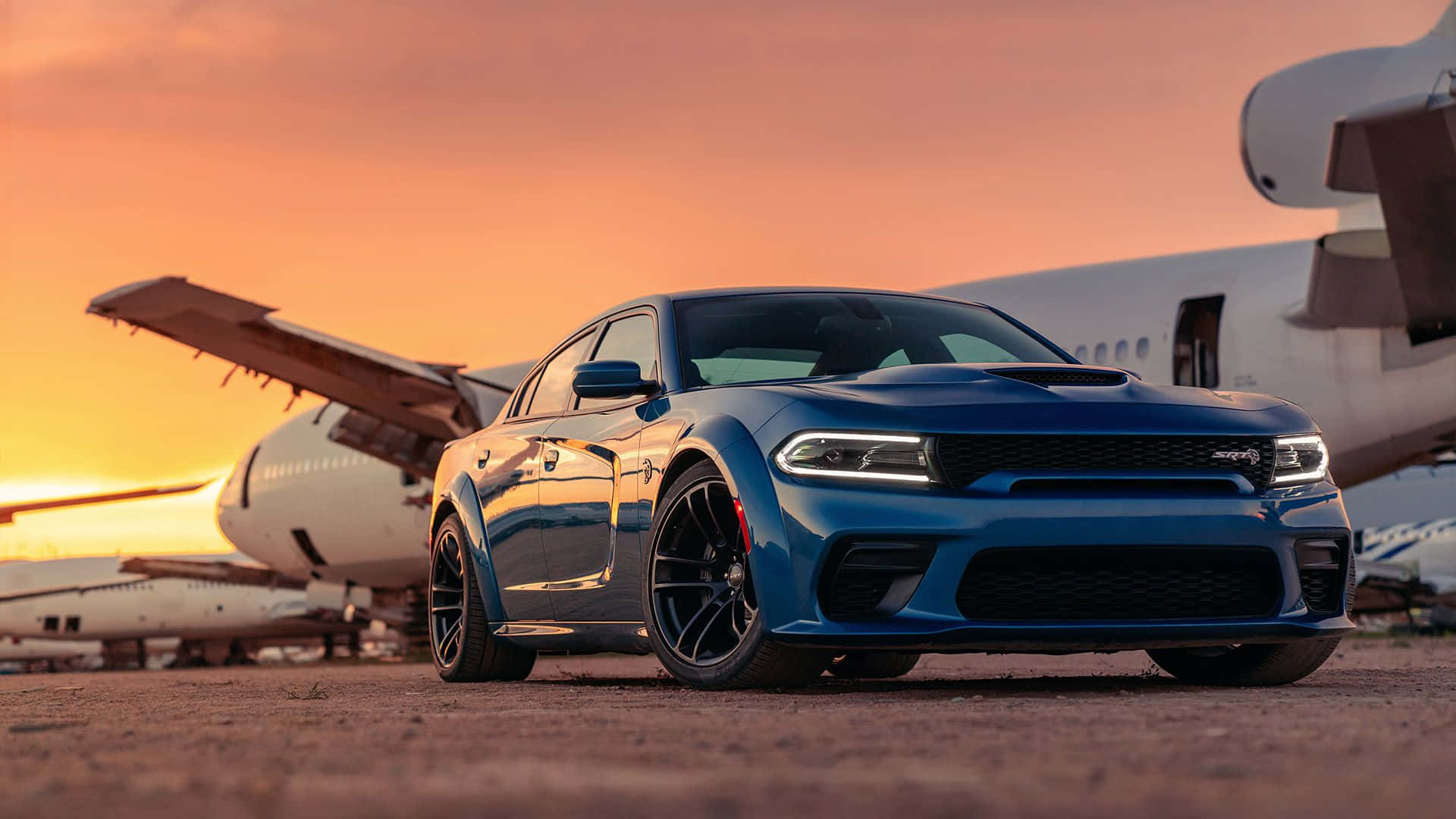 Powerful Dodge Charger Dominating the Roadways Wallpaper