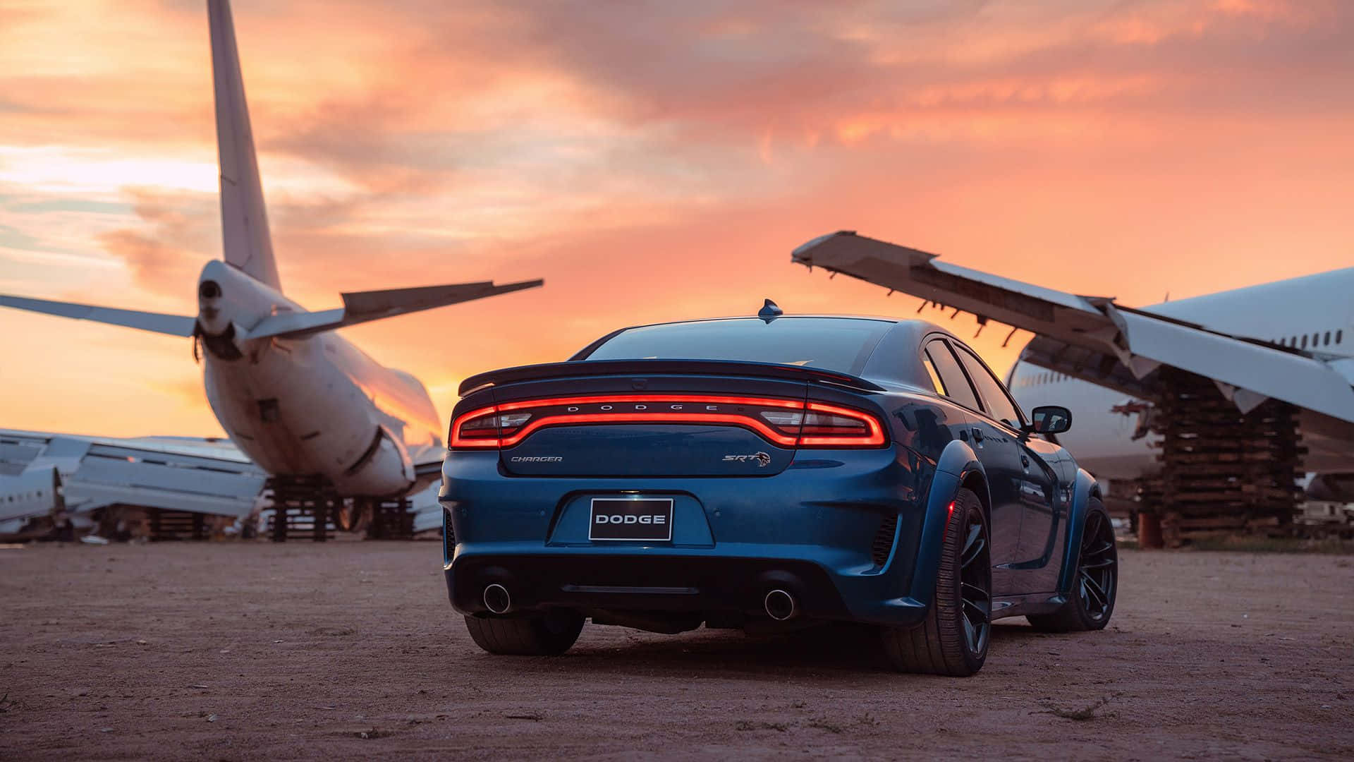 Power and Style - Dodge Charger on the Road Wallpaper