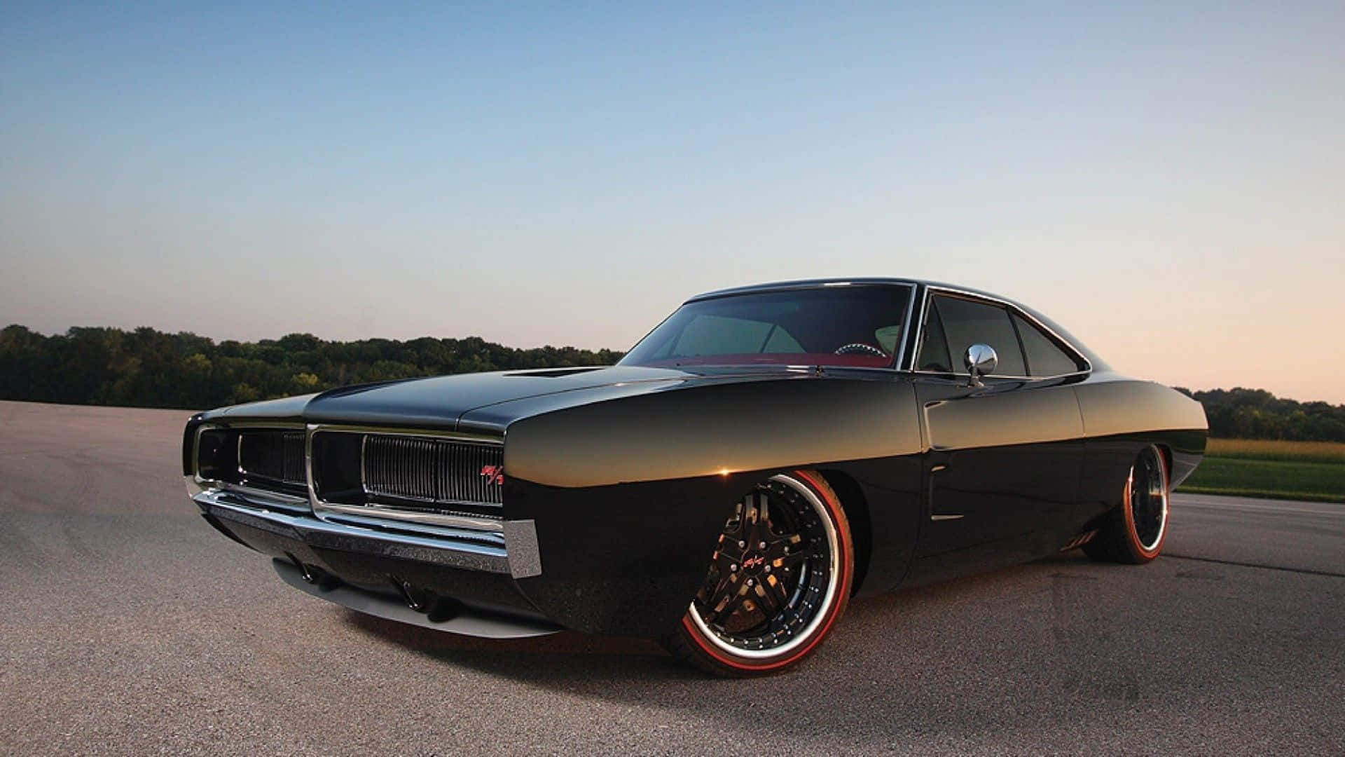 Powerful Dodge Charger in Action Wallpaper